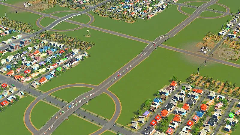 Cities:Skylines（PCゲーム）の高速道路を車が渋滞せずに通行している様子