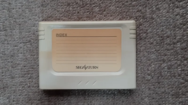 セガサターン本体の純正パワーメモリーの本体写真（INDEXラベル付き）